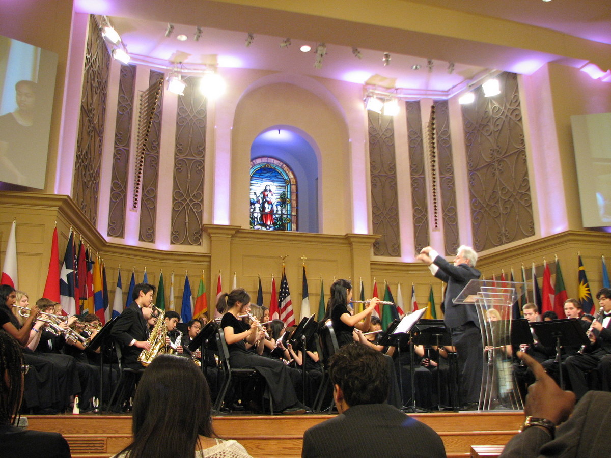 a person that is playing music and some flags