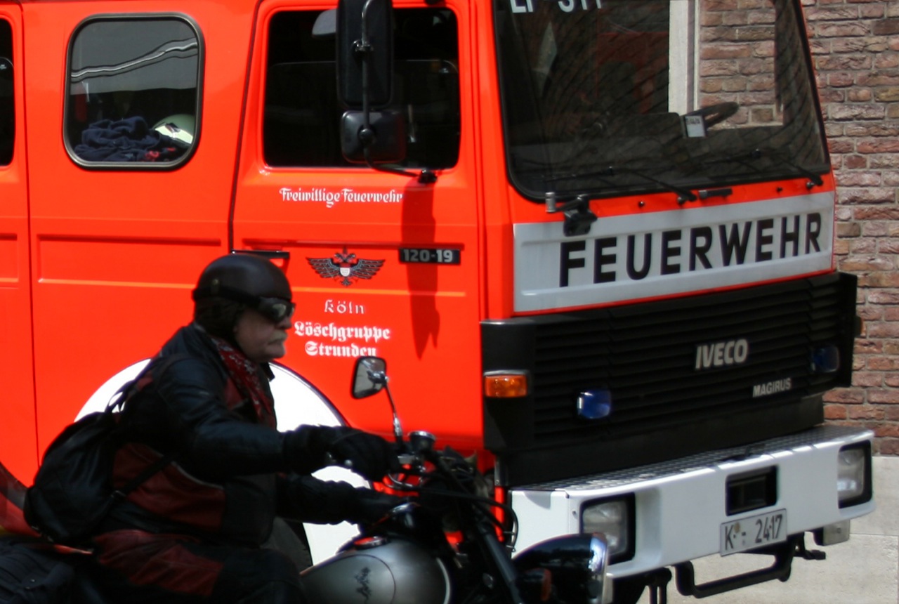 the motorcycle rider is sitting on his bike