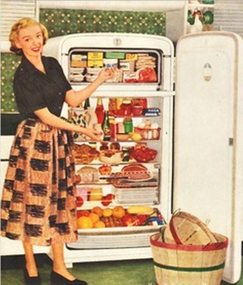 an old po of a woman opening the refrigerator