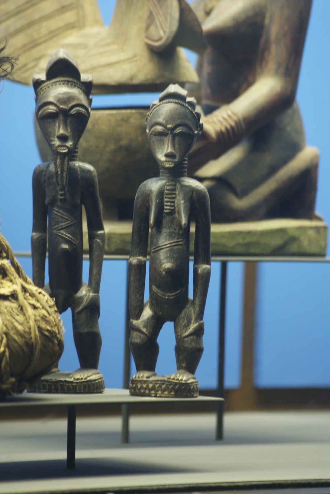 african style statues displayed next to each other