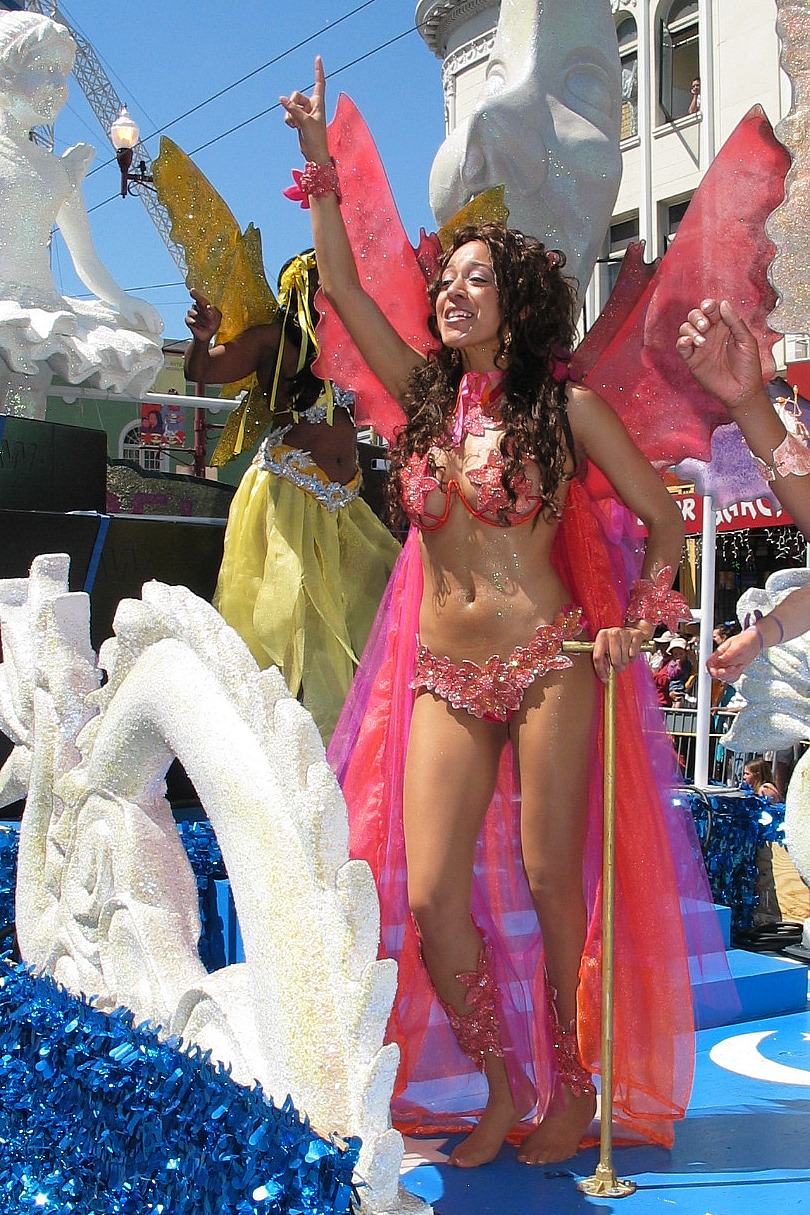woman in a costume performing in a parade