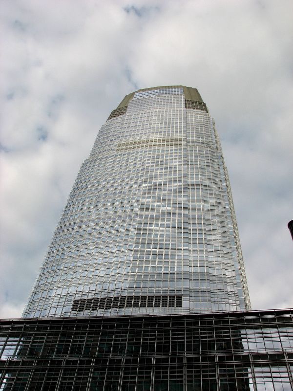 a building made of metal and glass with no roof