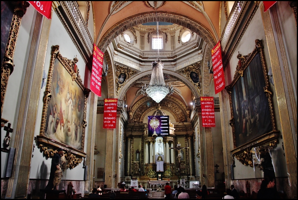 inside of the church with a group of people