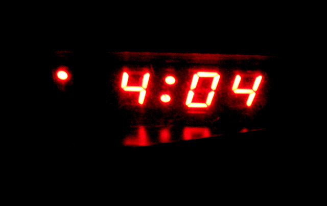 the clock reads four forty on its display