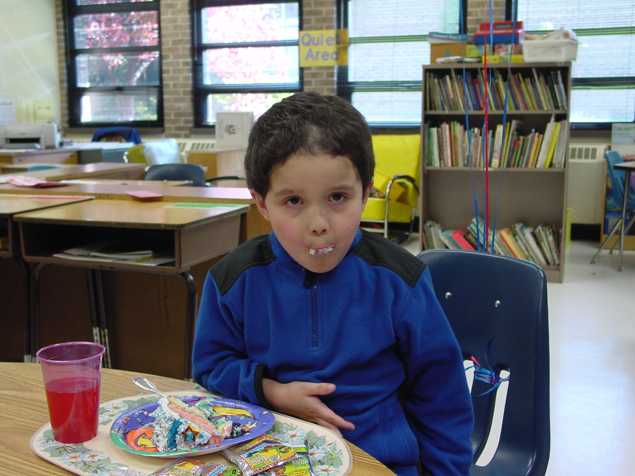 there is a  eating food in a classroom