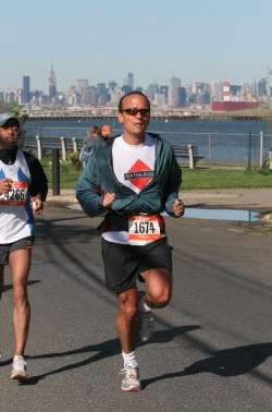 two men are running in a half marathon