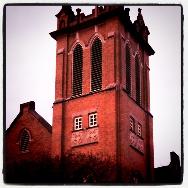 a church steeple with an ornate design on it
