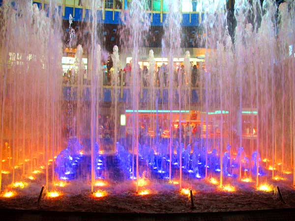 a view of a bunch of water fountains