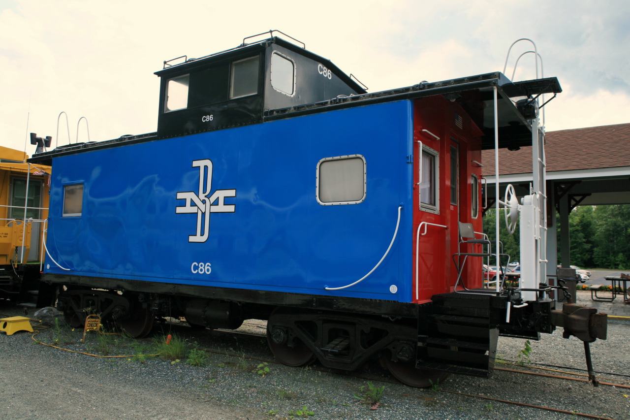 the train is blue and red with white letters
