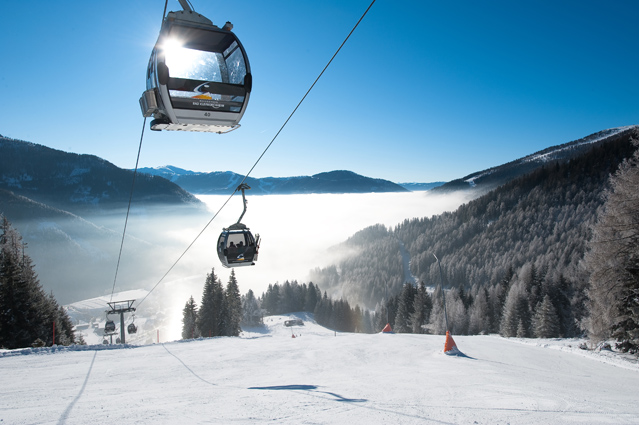 a gondola with a ski lift attached to it