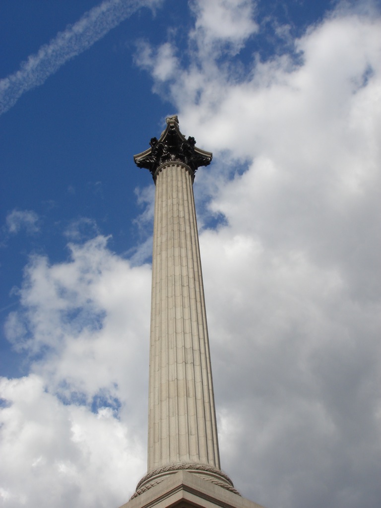 the top of a column on a cloudy day