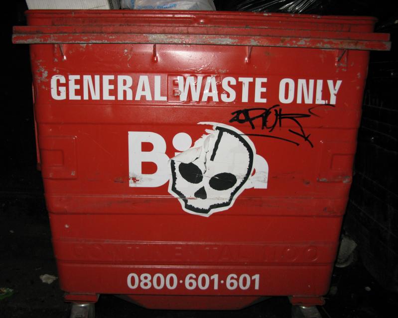 a red bin with a skull design on it