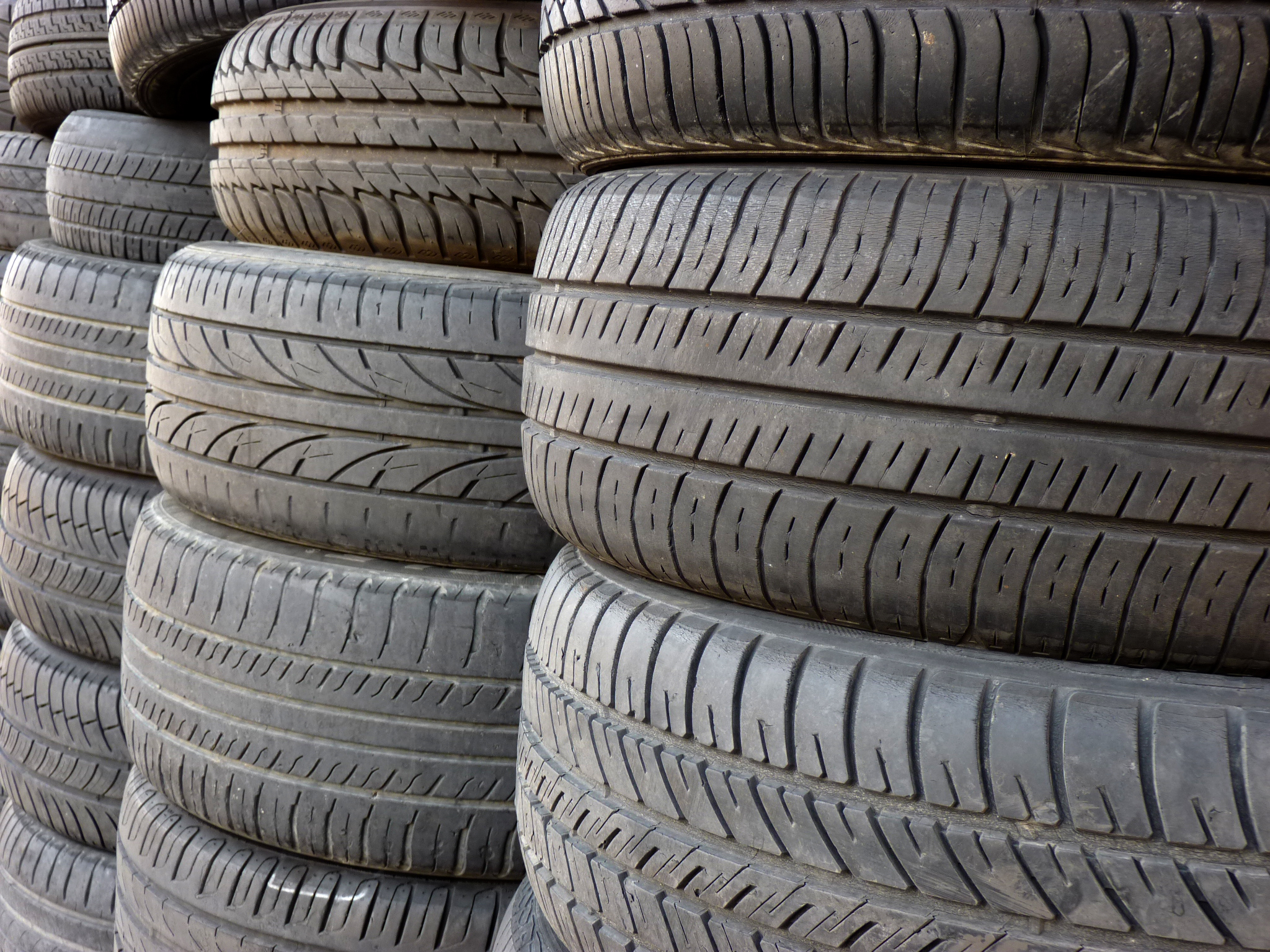 lots of different types of tires in a pile