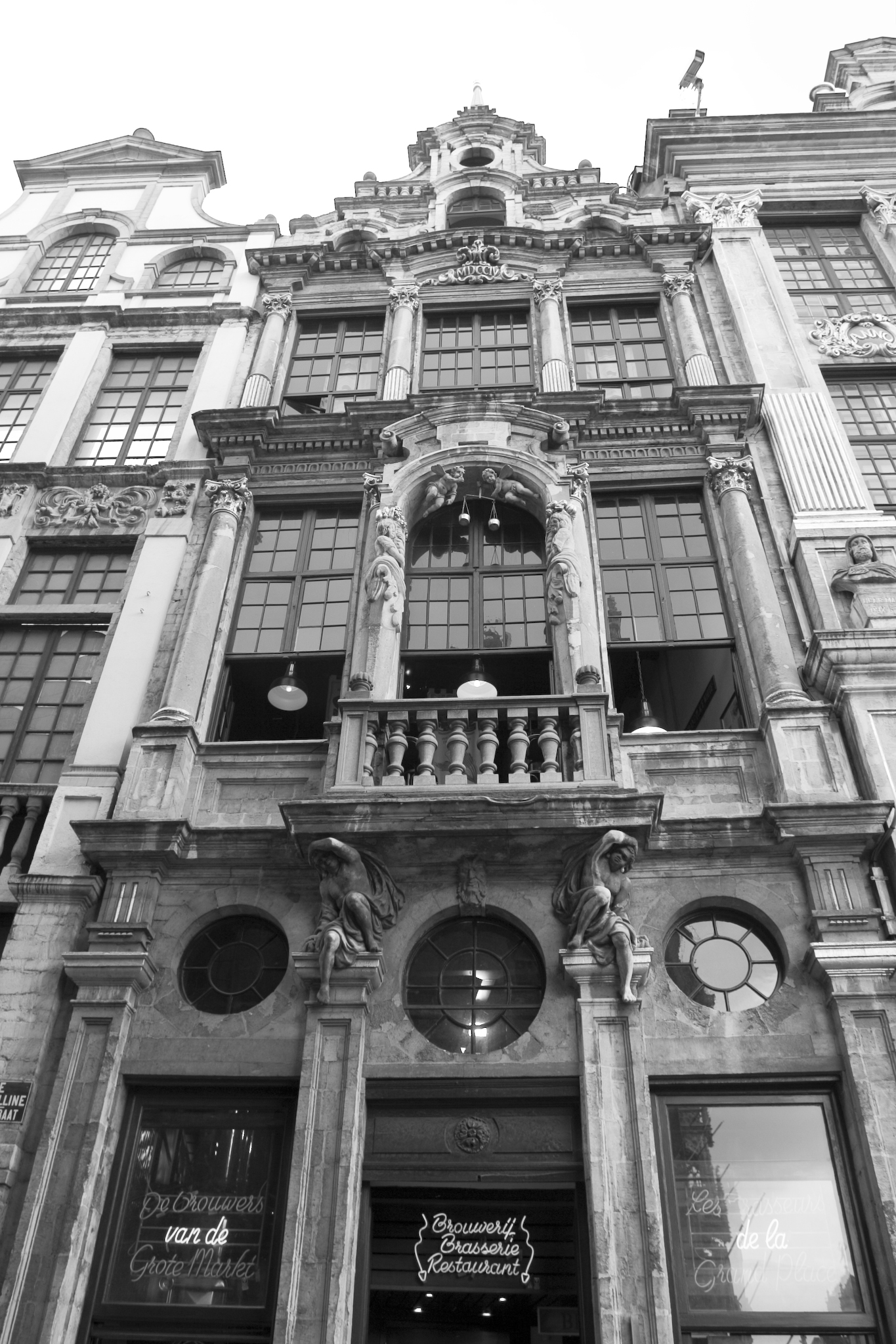 a tall building has ornate balconies on it