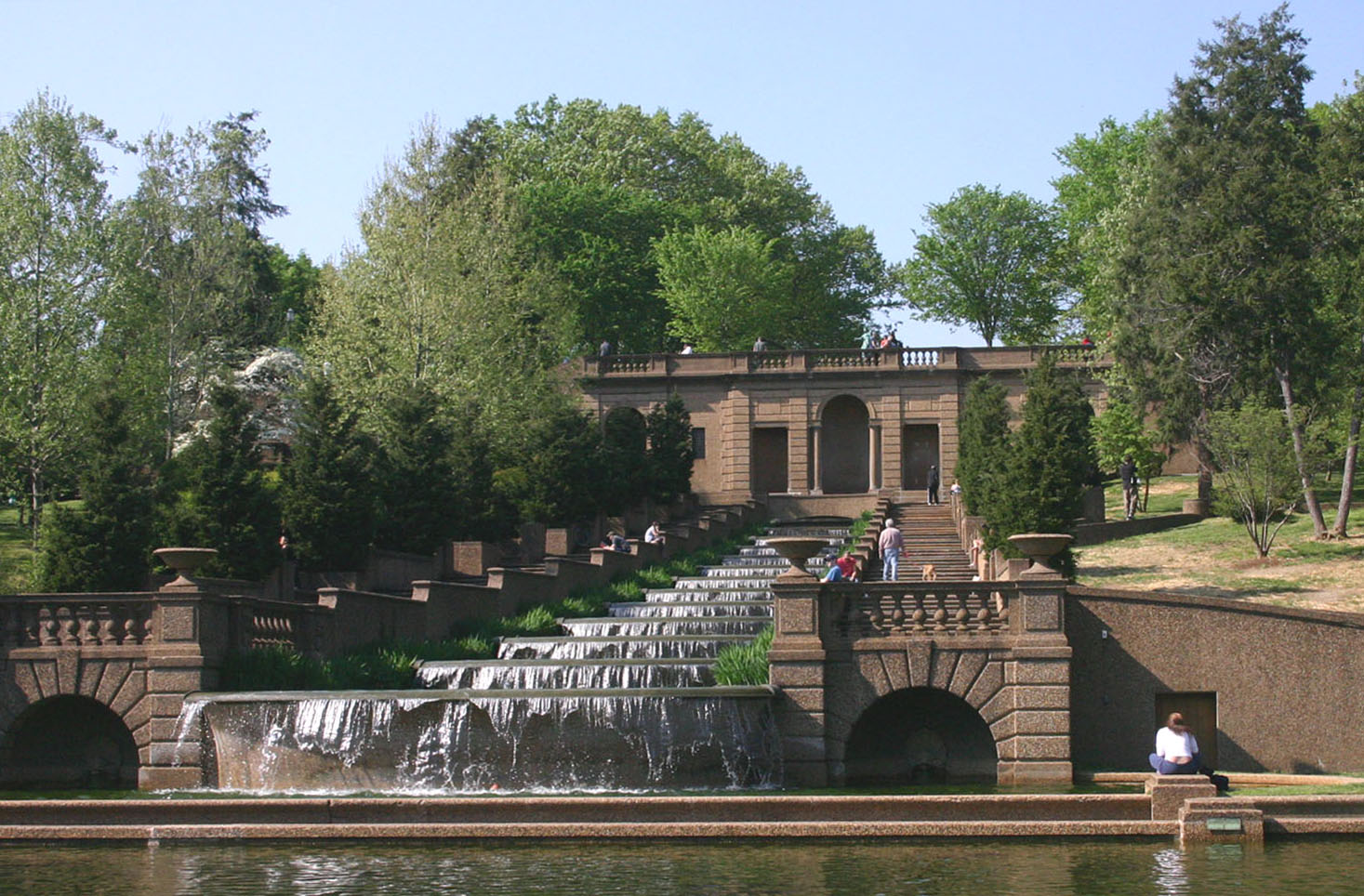 the water has a lot of fountains going down it