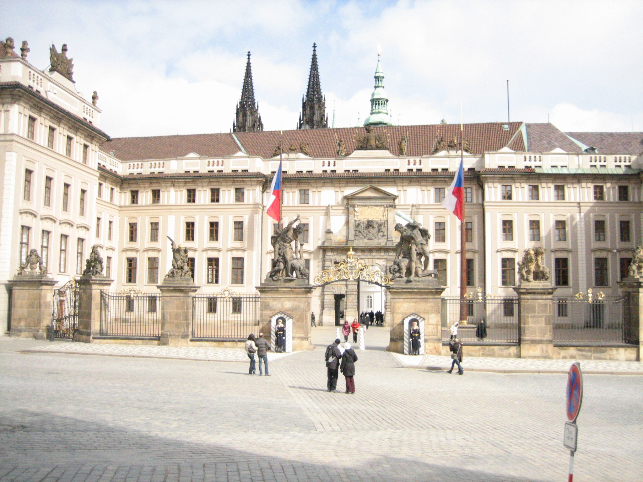 a castle that has some flags flying on it