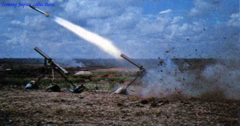 two military missiles with missiles on them hitting an opponent in a field