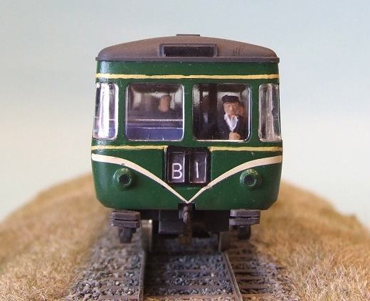 there is a toy train that has people inside