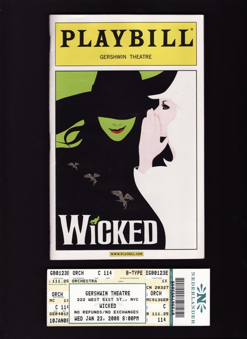 a movie ticket for the show starring a woman in a top hat