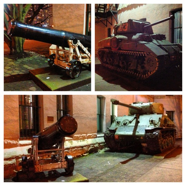 a few pictures of a tank in the middle of a building