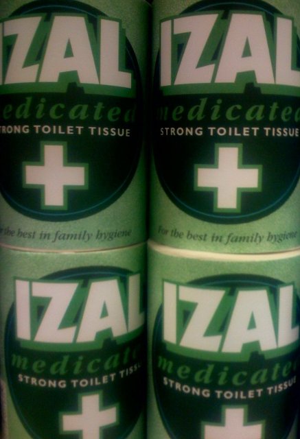 several green cans have white crosses on them
