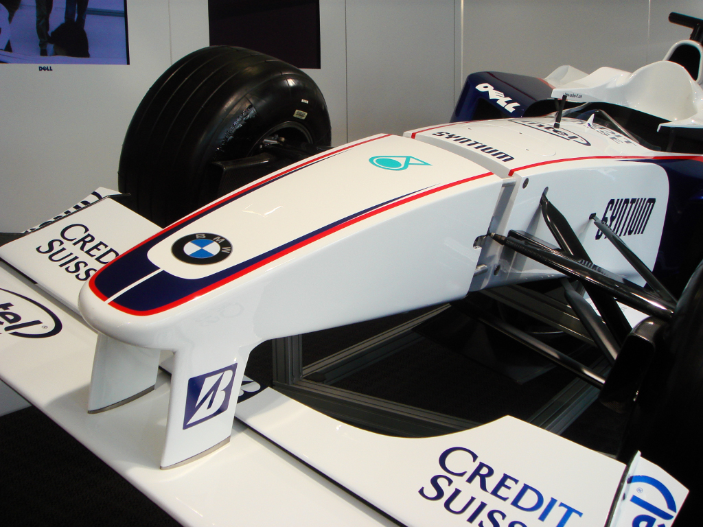 a bmw racing car that is on display