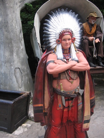 a statue with a costume made to look like native americans