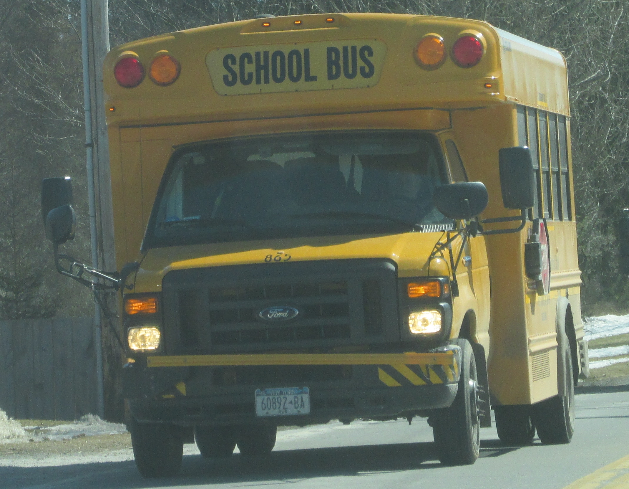 a school bus is going down the road