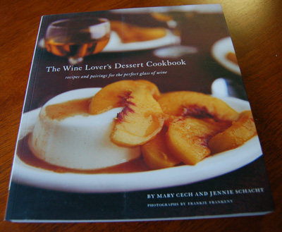 the wine lover's desert cookbook is sitting on a table