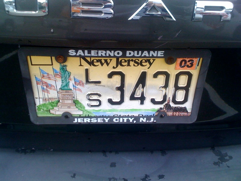 the license plate has an image of the statue of liberty