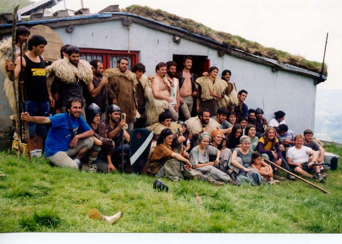 group of men posing for picture in native clothes