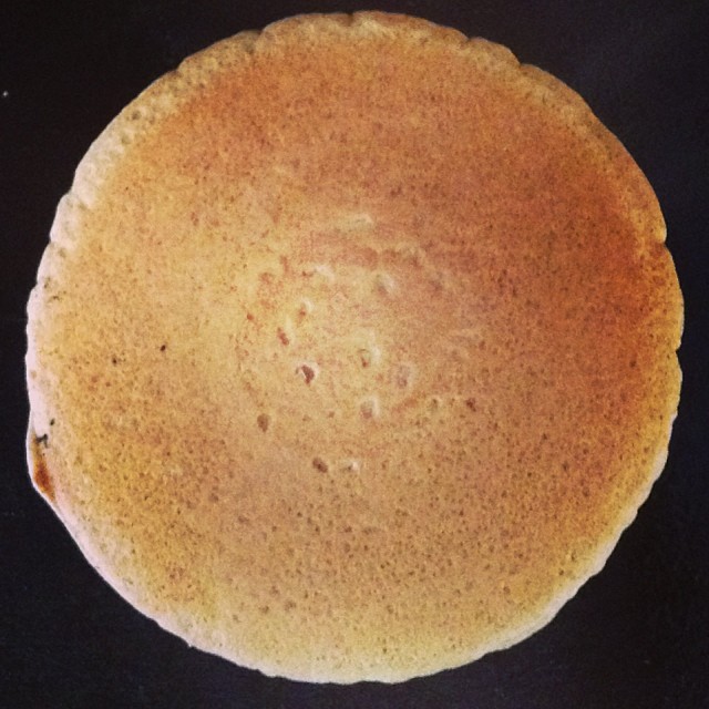 the top of a bread in a pan with the oil on it