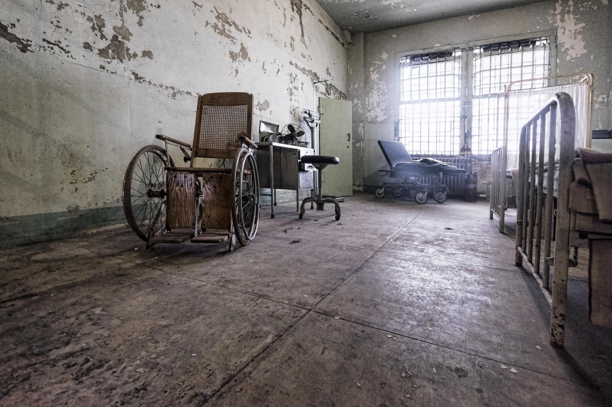 this is an old room with broken windows