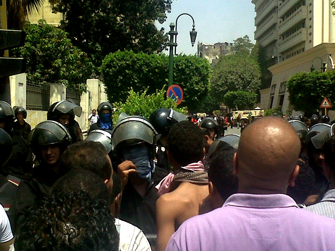 a crowd of people with helmets are standing together