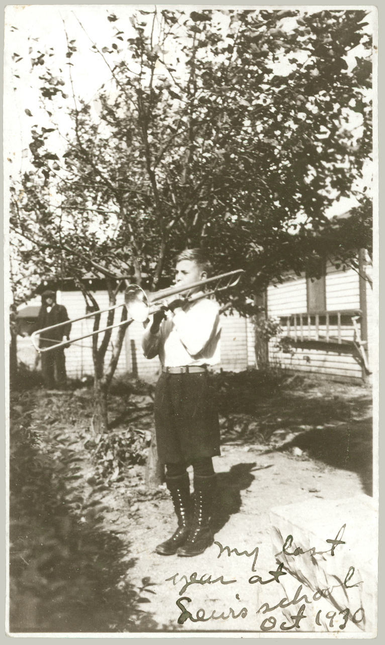 an old black and white po shows a woman holding her instrument