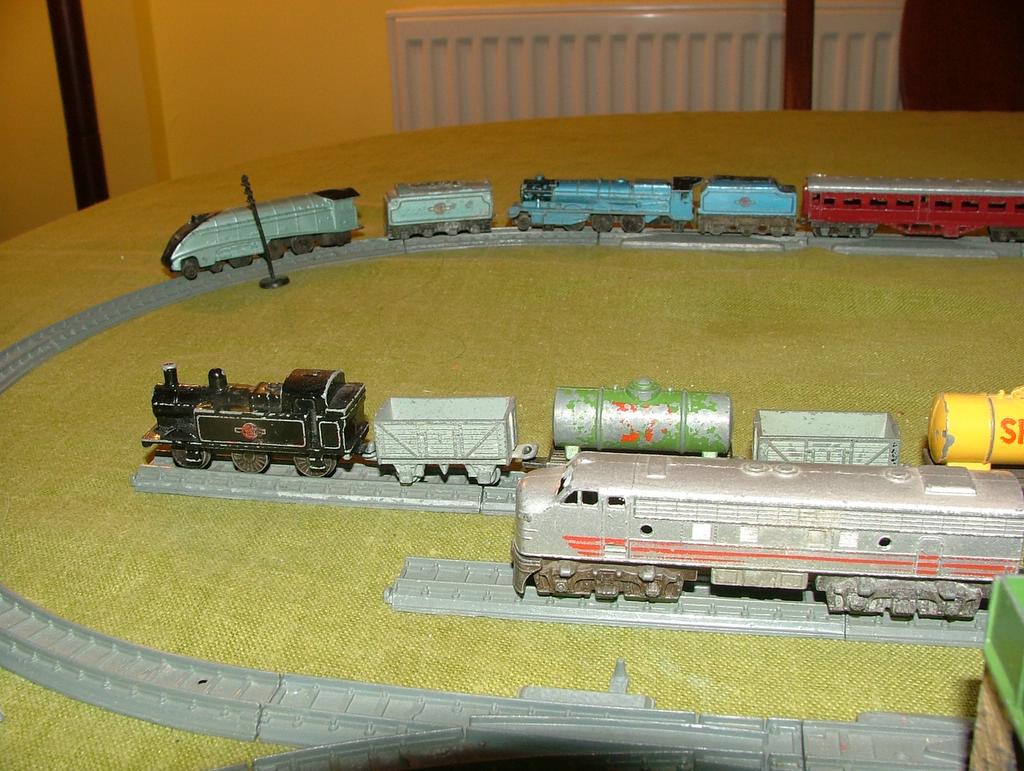 a model train set with tankers on tracks