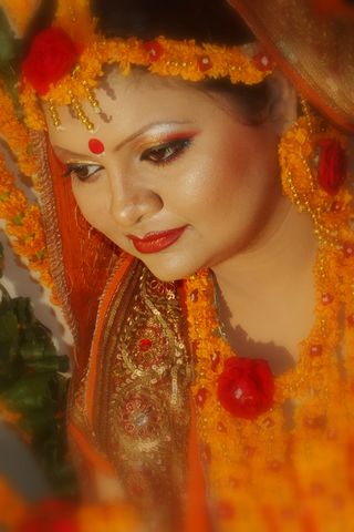an indian bride posing for a po