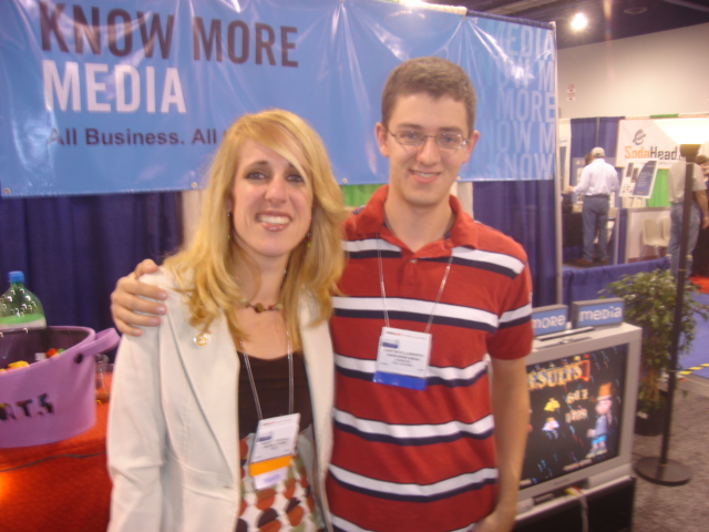 a woman and a man smiling at the camera