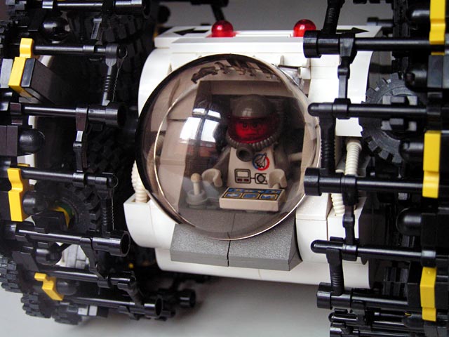 a lego vehicle with an electronic watch displayed