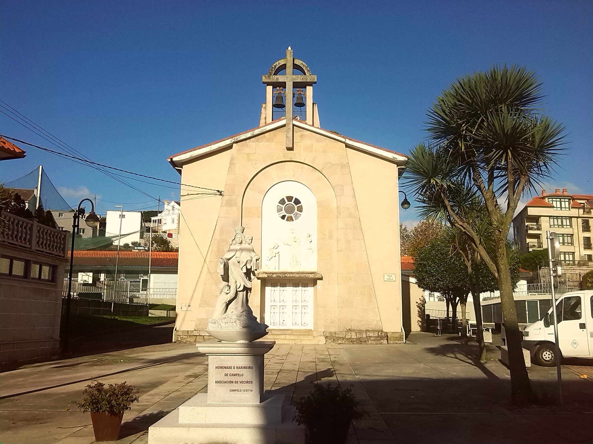 a church sits in the street of an empty neighborhood