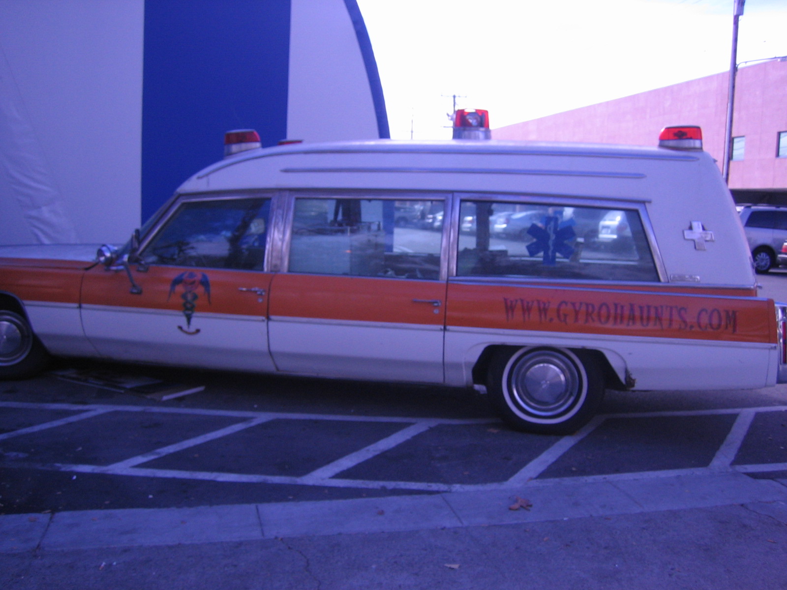 a car that is parked next to a building