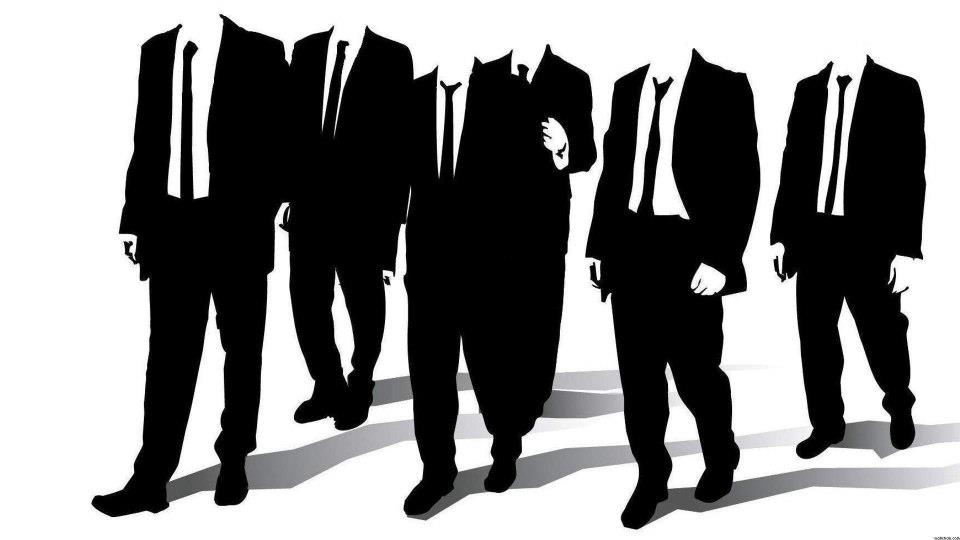 the silhouettes of three men wearing suits and ties