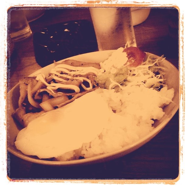 a plate of food with vegetables and a beverage