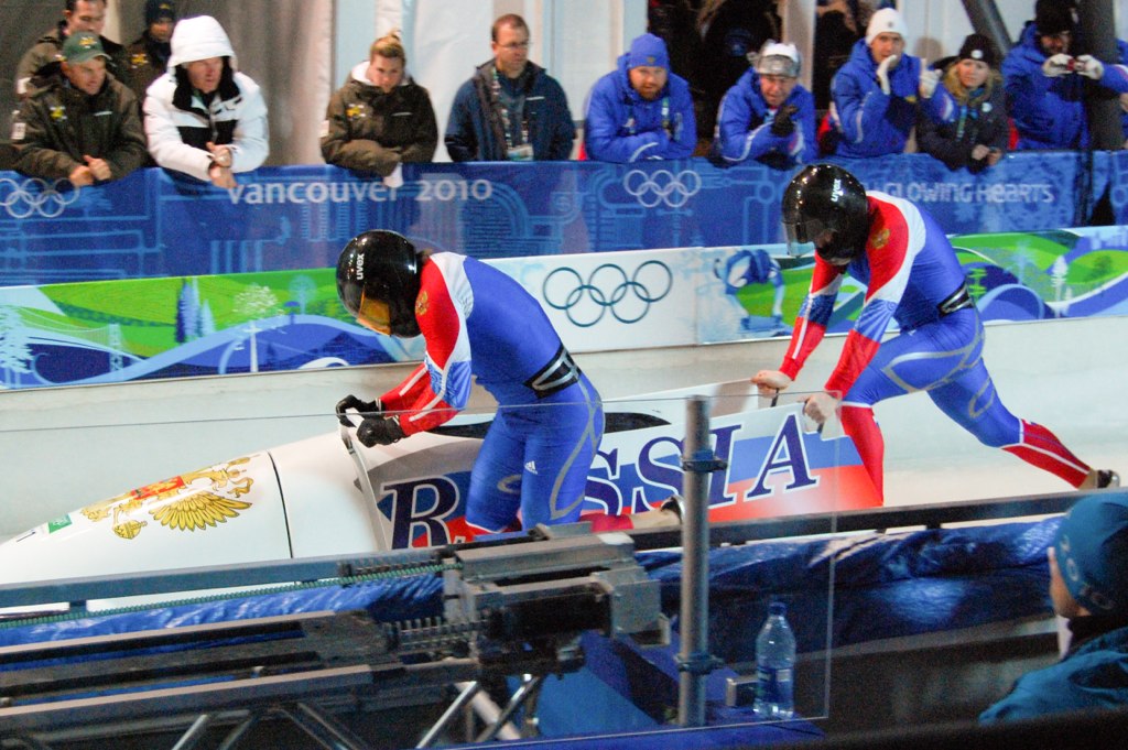 two women competing at the olympics in figure