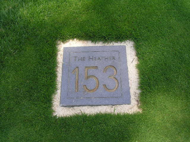 the patch of grass that covers the base of the memorial is shown