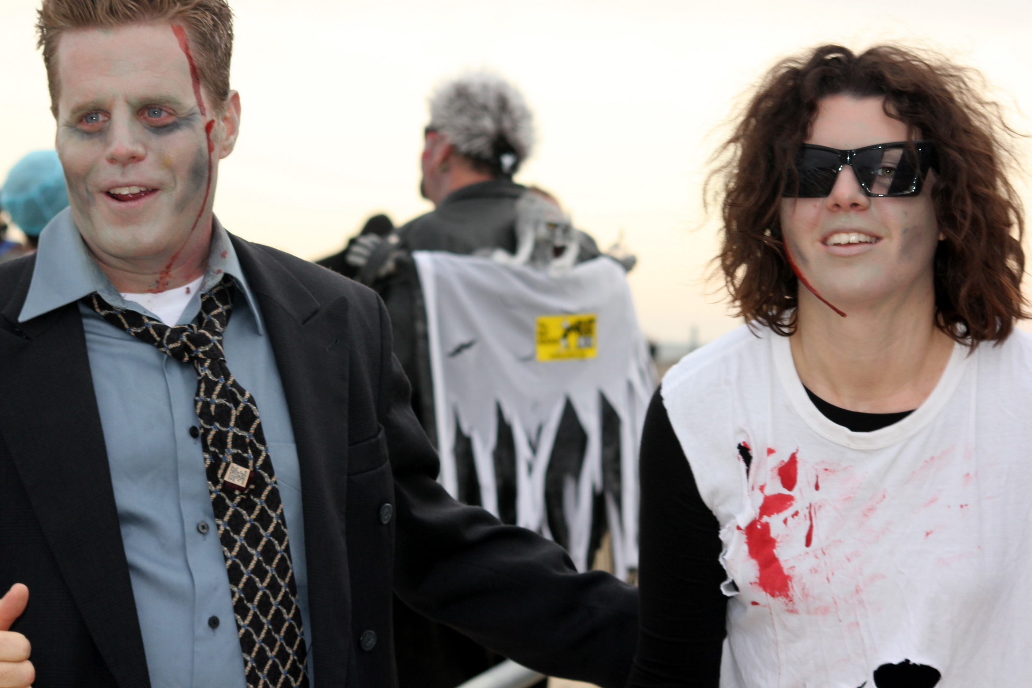 two people are dressed up in zombie costumes