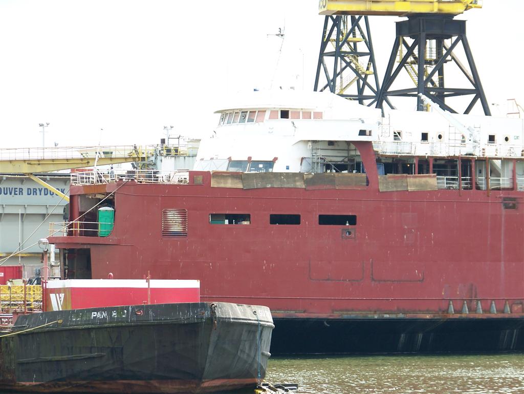 two barges next to each other in the water