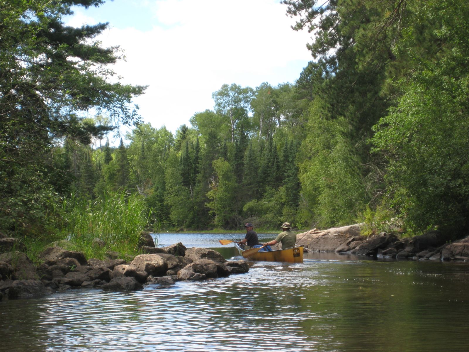 there are two people on a kayak in the water