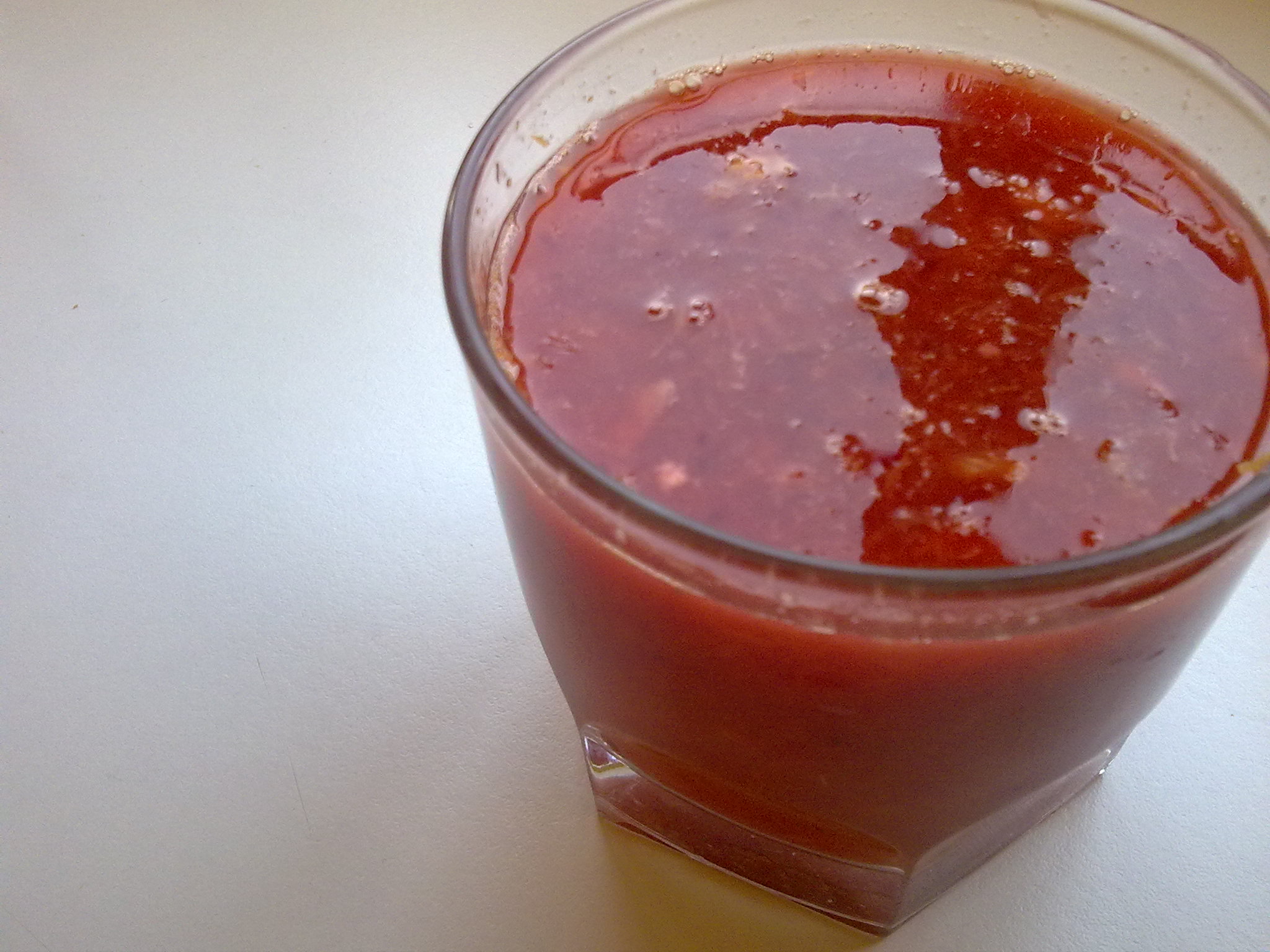 a glass of fresh fruit juice with no water