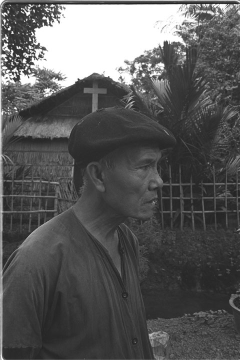 a black and white po of a man in the park